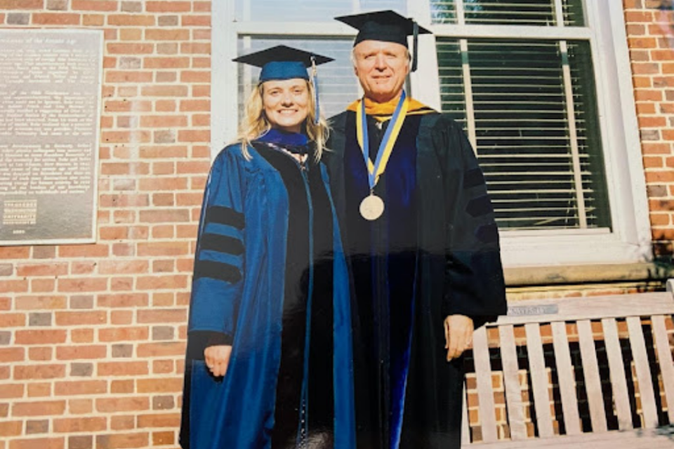 Energy scientist Maggie Teliska, PhD ’04, (left) with her faculty mentor Professor of Chemistry David Ramaker (right), who passe