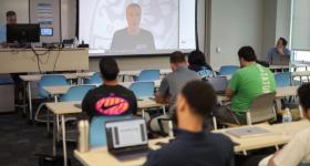 GW alumni Kevin Clark (r) and Scott Rezendes (at the monitor) are co-teaching Management of Global Soccer this summer and bring in guest speakers such as VfB Stuttgart executive Koija Dickmann. (Lily Speredelozzi/GW Today)